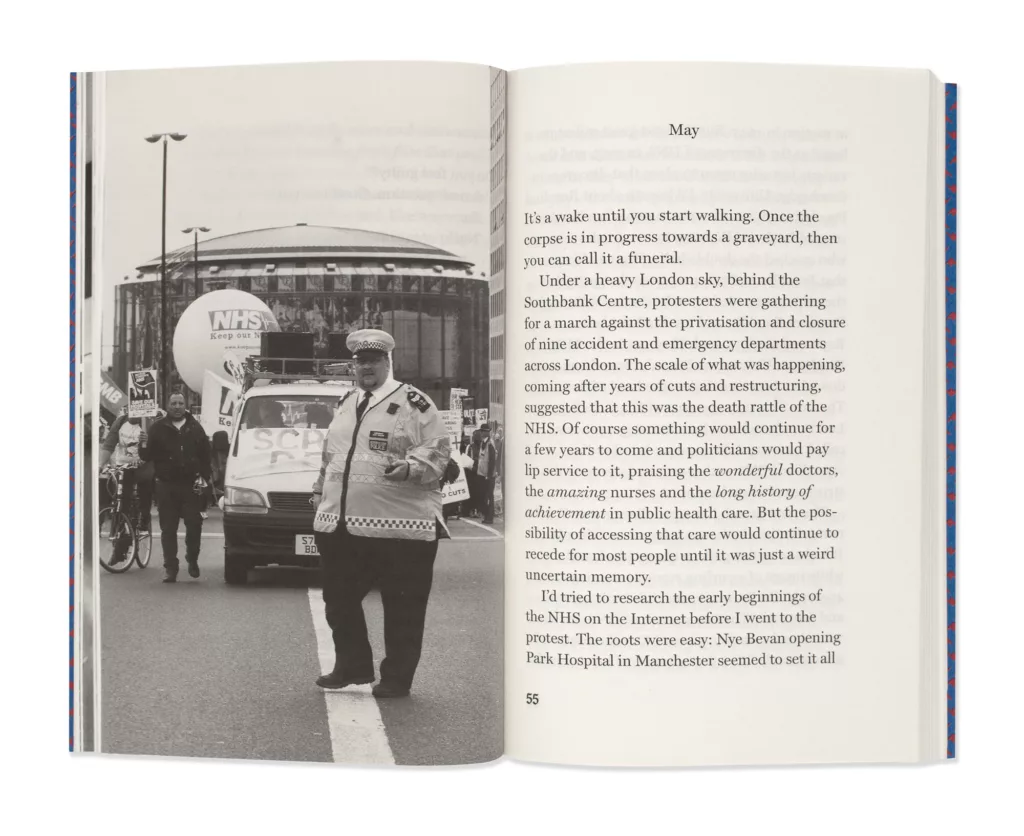 An open book displaying a page with an image of a quiet street scene on the left side and a text passage on the right side, discussing a moment in history with a focus on societal changes and demonstrations.