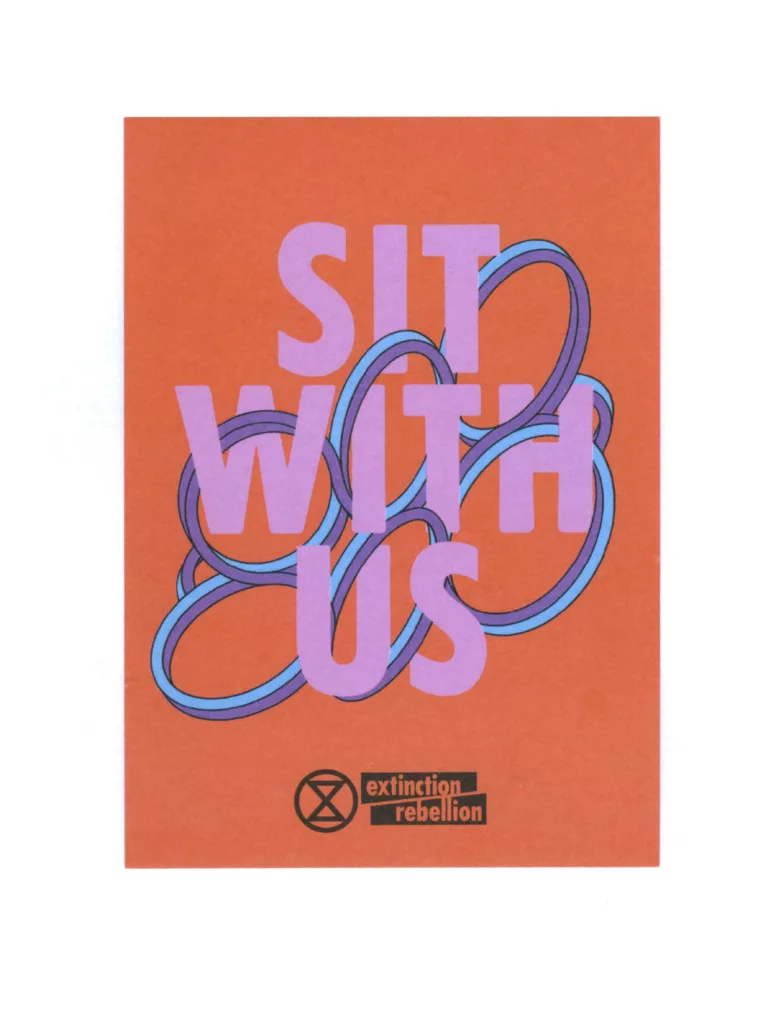 A promotional poster with a bold, graphic design featuring the phrase "sit with us" in large, stylized purple lettering overlaid on a tangled line illustration, with the extinction rebellion logo at the bottom, suggesting an invitation for a peaceful protest or gathering related to environmental activism.