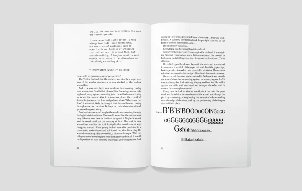 An open book with two pages visible: the left page contains structured text with paragraphs, and the right page shows large, bold lettering of the letters "b" and "g" in various sizes along with the word "ghhhhhhhh" in a large, expressive font, suggesting a creative or artistic element within the book's content.