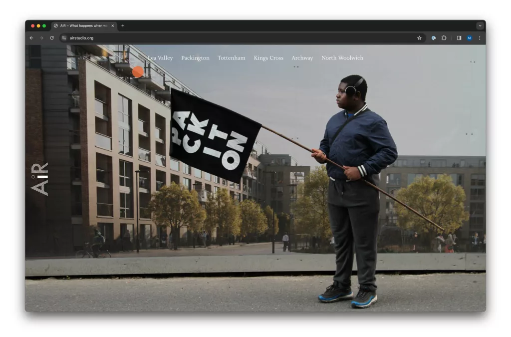 A person standing on a street holding a flag with "4x4=16 run" written on it, with a backdrop of a calm urban scene, possibly symbolizing a protest or promotional event related to education or mathematics.