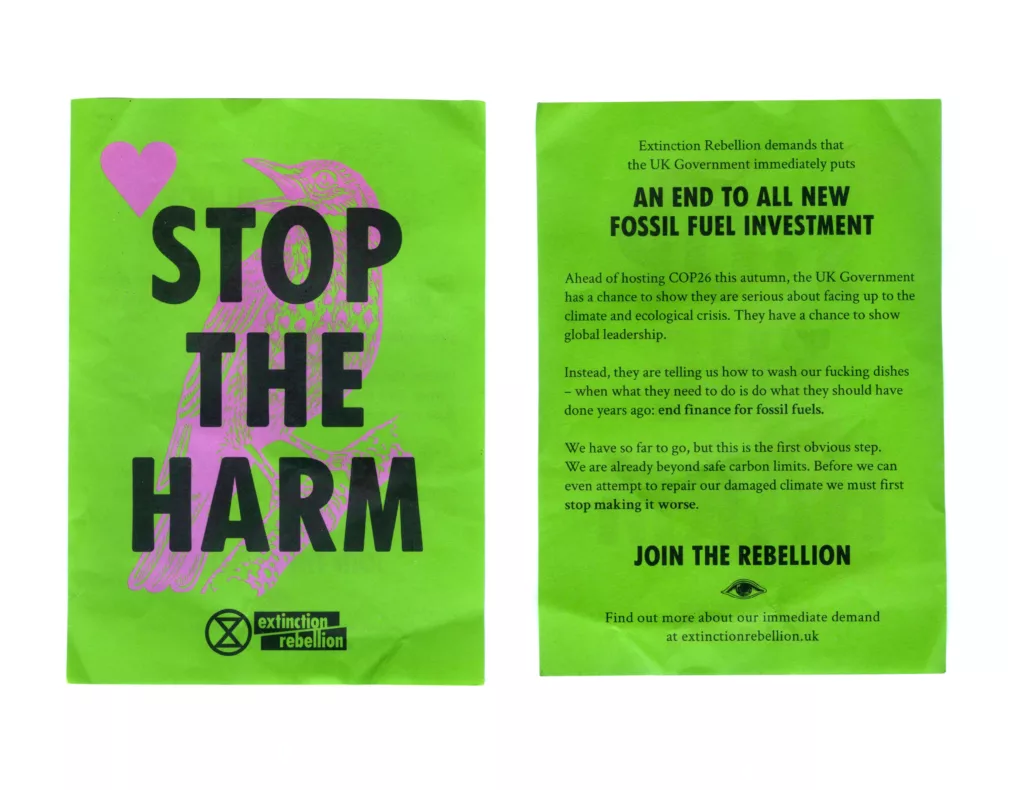 A bright green leaflet with bold graphics promoting climate action, featuring the extinction rebellion logo and slogans calling for an end to fossil fuel investments by the uk government, and inviting the reader to join the rebellion.